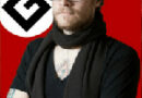 Image of a stern-looking man with his arms folded and the word irregardless printed across the top of the image