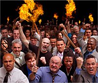 Angry crowd holding flaming torches