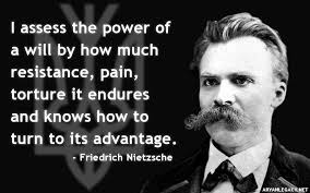 Black-and-white portrait of bearded man with quote