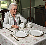 old woman eating alone