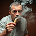 man smoking a blunt