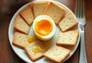 a plate with a sodt boiled egg in the middle surrounded by sluices of melba toast