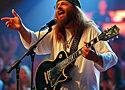 jesus playing a guitar