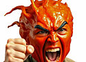 a head shot of a man with kimchi all ofer his face