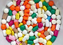 a bowl full of pills