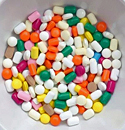 a bowl full of pills