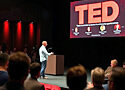 a man giving a TED talk