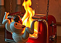 image of a toaster on fire