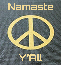 a yoga mat with a peace symbol on it