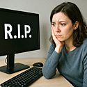 A woman staring at a computer screen on National Google Your Symptoms Day.