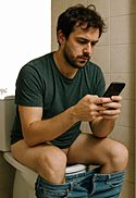A man sending a breakup text while sitting on the can dropping a deuce