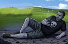 Man reclining on grassy hill wearing skull shirt