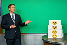 Illustration for The National Weather Service Introduces Emotional Forecasts, featuring a weather man in a dark blue suit in front of a green screen.