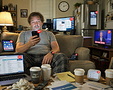 Middle-aged man surrounded by glowing devices and endless phone notifications sits exhausted in a cluttered living room as alerts flood every screen.